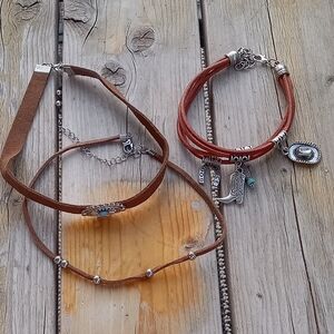 Bundle of two chokers and a charm bracelet. 🤩